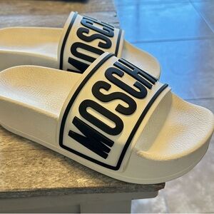 Authentic Moschino platform slides, white, and black raised label size 38